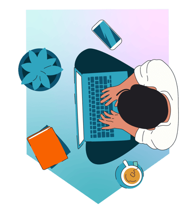 A person is working on a laptop at a desk seen from above. A plant, a book, a smartphone, and a cup with a drink are placed around the workspace.