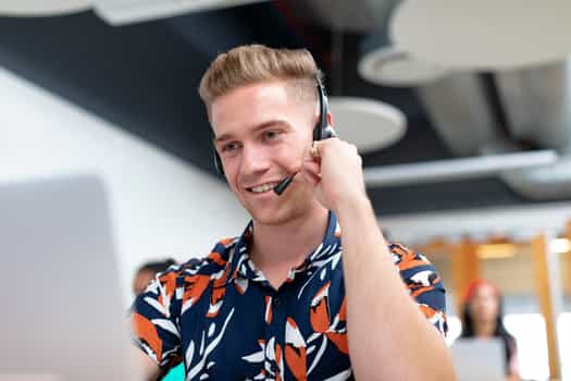 male-customer-service-executive-talking-headset-modern-office